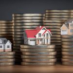 Houses of different size with different value on stacks of coins. Concept of property, mortgage and real estate investment. 3d illustration